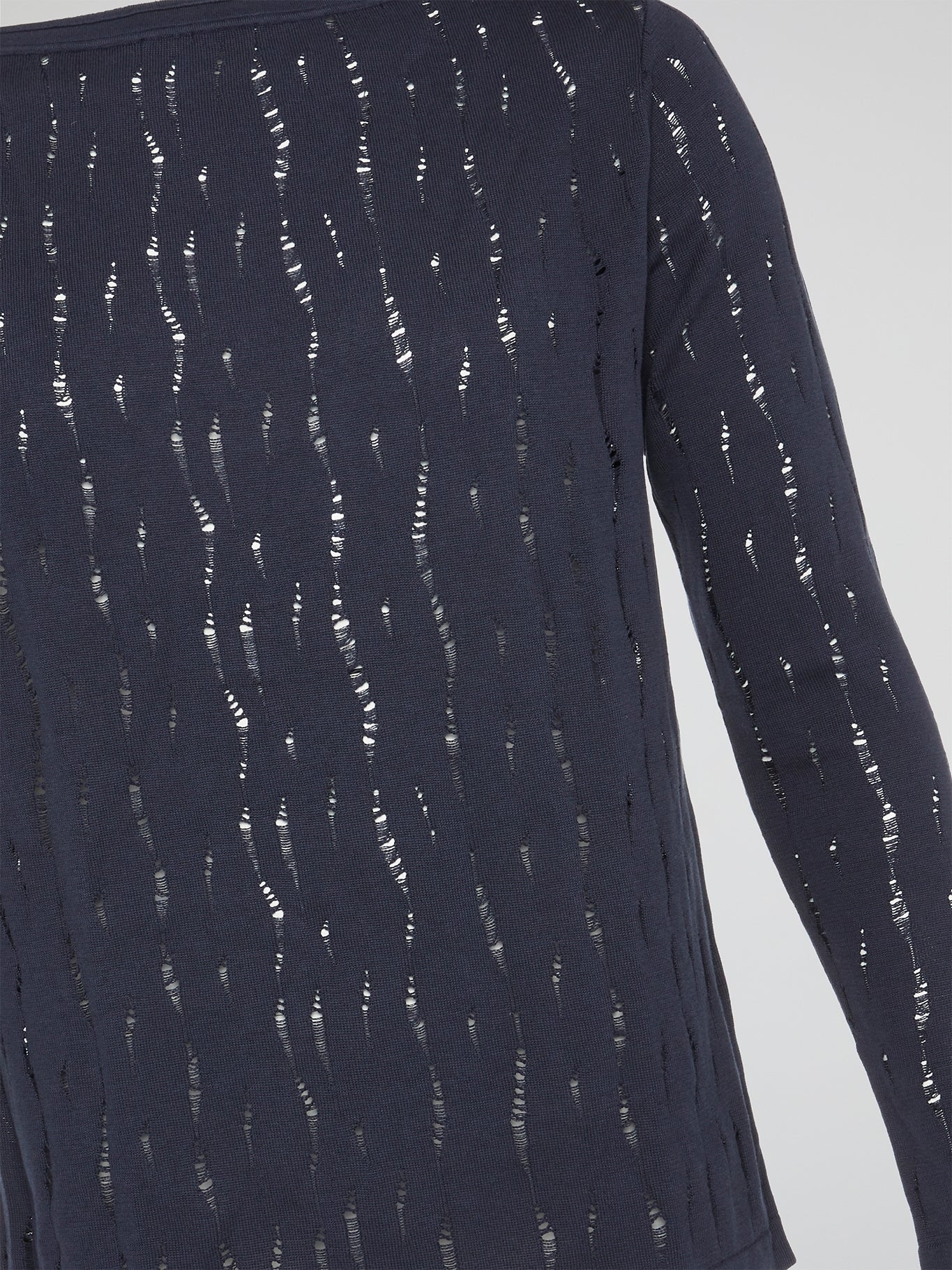 Embrace a touch of urban chic with the Navy Distressed Long Sleeve Top by Roberto Cavalli. This edgy yet sophisticated piece features intricate distressing details and a timeless navy hue, perfect for effortlessly elevating any outfit. Make a bold style statement and stand out from the crowd with this fashion-forward top that exudes confidence and individuality.