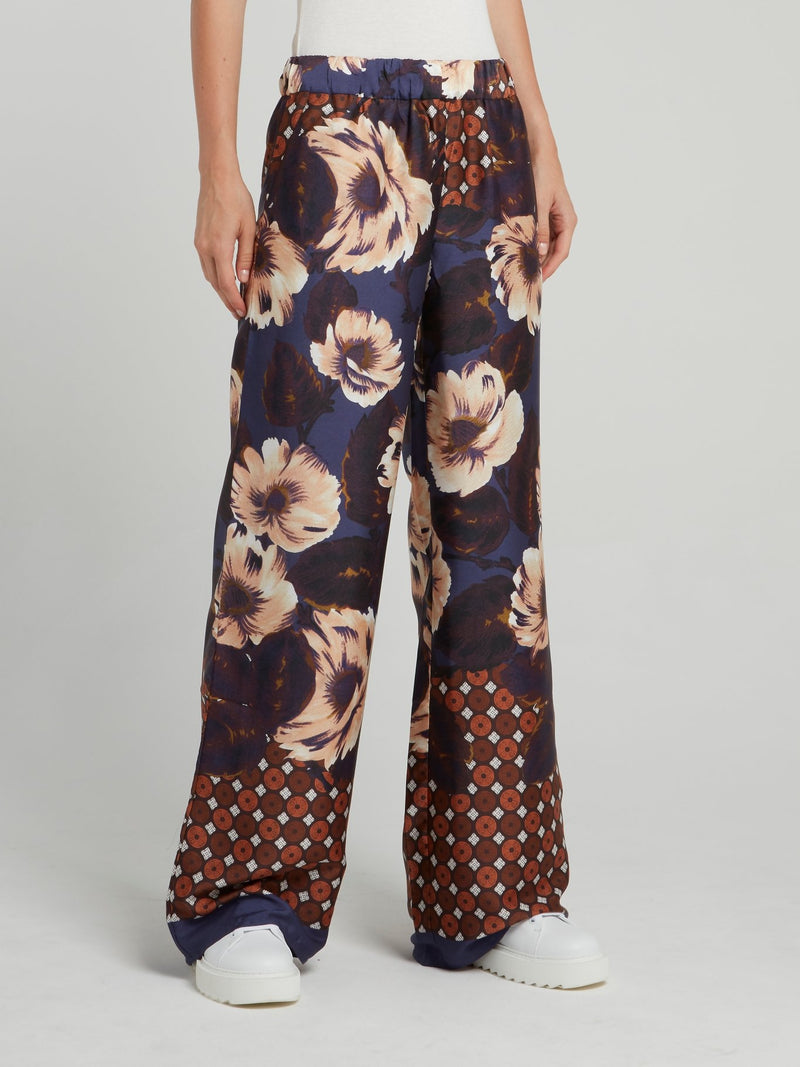 Широкие брюки в горошек с цветочным принтом