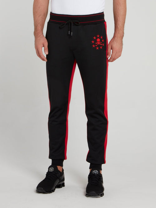 Черные спортивные брюки с изображением звезд и черепа