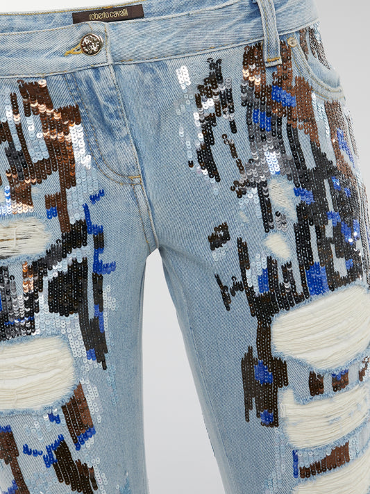 Let your inner rockstar shine with these Sequin Detailed Distressed jeans from Roberto Cavalli. The intricate sequin embellishments add a touch of glamour to the edgy distressed denim, perfect for making a statement wherever you go. Slip into these jeans and unleash your bold, fearless style that is bound to turn heads and spark conversations.