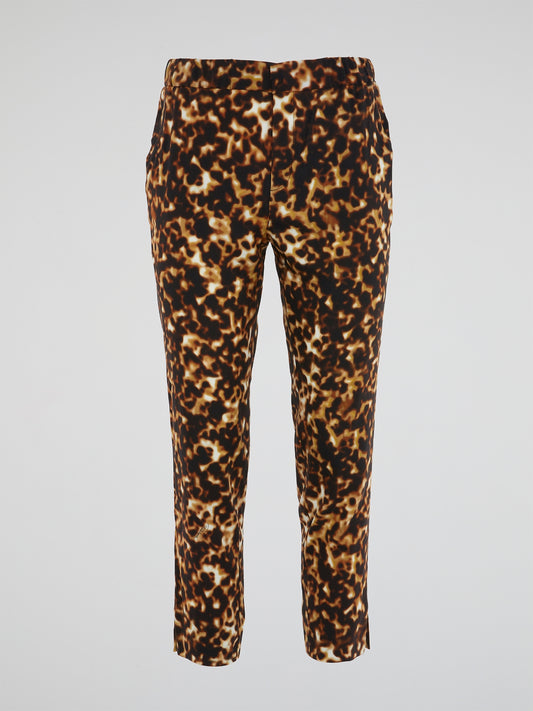 Unleash your inner fierce fashionista with these Leopard Print Elasticated Waist Pants from Roberto Cavalli. Made for the bold and the fearless, these pants exude confidence and style in every step. Elevate your wardrobe with a touch of wild sophistication and turn heads wherever you go.