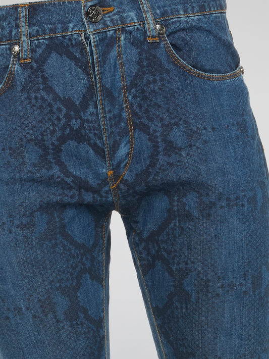 Indulge in your wild side with these fierce Snake Print Slim Fit Jeans by Roberto Cavalli. The eye-catching print and flattering fit make these jeans a must-have for any fashion-forward individual looking to make a statement. Embrace your inner fashionista and stand out from the crowd in these edgy and versatile jeans.