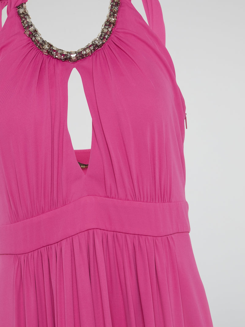 Channel your inner goddess in this stunning Pink Crystal Embellished Halter Neck Maxi Dress by Roberto Cavalli. The luxurious crystals add a touch of glamour to the flowy silhouette, making it perfect for any special occasion. Stand out from the crowd and turn heads wherever you go in this show-stopping piece.