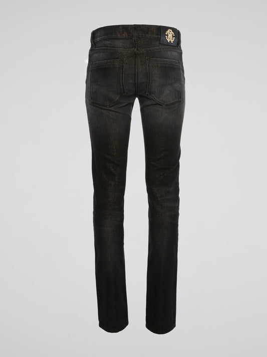 Unleash your inner rockstar with these edgy black acid wash skinny jeans from Roberto Cavalli. The unique acid wash finish adds a rebellious vibe to a classic silhouette, perfect for standing out in a crowd. Elevate your style game and turn heads wherever you go with these statement-making jeans.