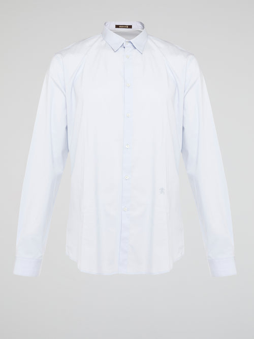 Elevate your wardrobe with the effortlessly chic White Long Sleeve Shirt by Roberto Cavalli. Crafted from luxurious fabric with impeccable attention to detail, this versatile piece exudes sophistication and glamour. Embrace a timeless look that seamlessly transitions from day to night with this must-have staple.