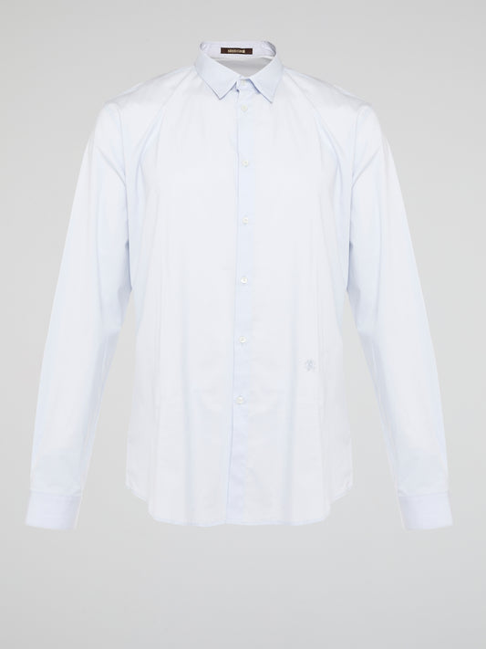 Elevate your wardrobe with the effortlessly chic White Long Sleeve Shirt by Roberto Cavalli. Crafted from luxurious fabric with impeccable attention to detail, this versatile piece exudes sophistication and glamour. Embrace a timeless look that seamlessly transitions from day to night with this must-have staple.