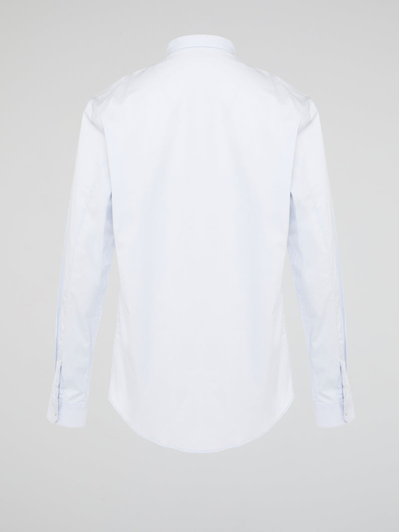 Elevate your wardrobe with the effortlessly chic White Long Sleeve Shirt by Roberto Cavalli. Crafted from luxurious fabric with impeccable attention to detail, this versatile piece exudes sophistication and glamour. Embrace a timeless look that seamlessly transitions from day to night with this must-have staple.