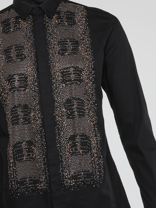 Feel fierce and fashion-forward in the Black Studded Long Sleeve Shirt by Roberto Cavalli. This edgy top is perfect for making a statement with its bold studs and sleek silhouette. Command attention and turn heads wherever you go in this must-have wardrobe staple.