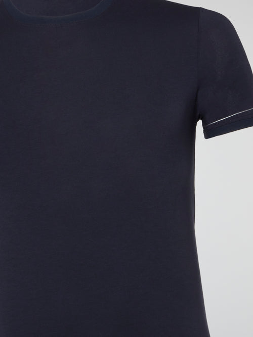 Indulge in unparalleled comfort and style with the Navy Ribbed Trim T-Shirt from Roberto Cavalli Underwear. Crafted with exquisite attention to detail, this t-shirt features a flattering ribbed trim that adds a touch of sophistication to your everyday look. Elevate your wardrobe with this luxurious piece that effortlessly combines fashion and comfort.