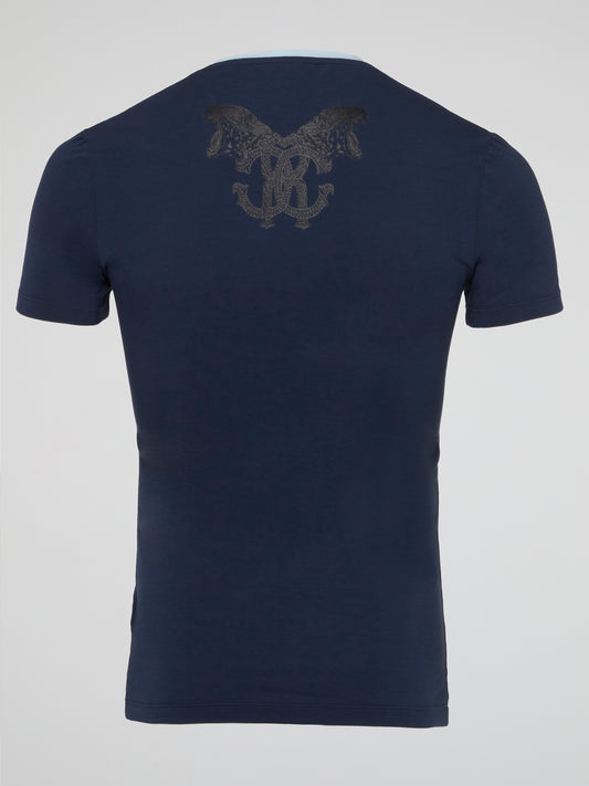 The Navy Logo Print Round Neck T-Shirt by Roberto Cavalli Underwear is a striking statement piece for anyone looking to elevate their casual wardrobe. With the iconic logo print front and center, this tee exudes luxury and style. Perfect for adding a touch of sophistication to your everyday look.