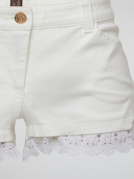 Embrace your inner bohemian goddess with these White Lace Trim Shorts by Roberto Cavalli. The delicate lace detailing adds a touch of elegance to these flowy shorts, perfect for a summer music festival or beach day. Channel your inner free spirit and stand out in style with this must-have addition to your wardrobe.