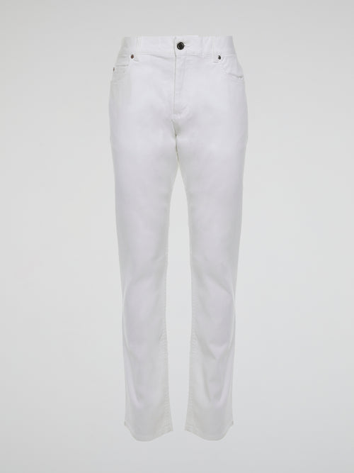 Introducing the epitome of impeccable style, the White Straight Cut Trousers by Roberto Cavalli. Crafted from luxuriously soft fabric, these trousers embrace elegance and sophistication with their sleek silhouette. Elevate your fashion game effortlessly, as you flaunt these timeless trousers that effortlessly blend comfort and class.