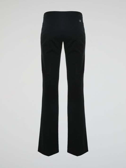Step into the world of effortless glamour with these Black Flared Trousers by Roberto Cavalli. Crafted with meticulous precision, these trousers boast a striking silhouette that elegantly skims the figure, accentuating every curve. From the office to a night out, these trousers are a timeless wardrobe staple designed to make a bold fashion statement.