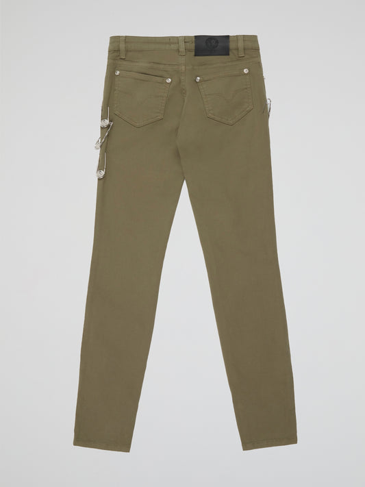 Step into effortless style and timeless elegance with the Olive Straight Cut Pants by Versus Versace. Crafted from luxurious olive green fabric, these pants feature a flattering straight-leg silhouette that elongates the legs and accentuates your curves. Whether paired with a crisp white blouse for a polished office look or a sleek leather jacket for a night out, these pants effortlessly exude sophistication and flair.