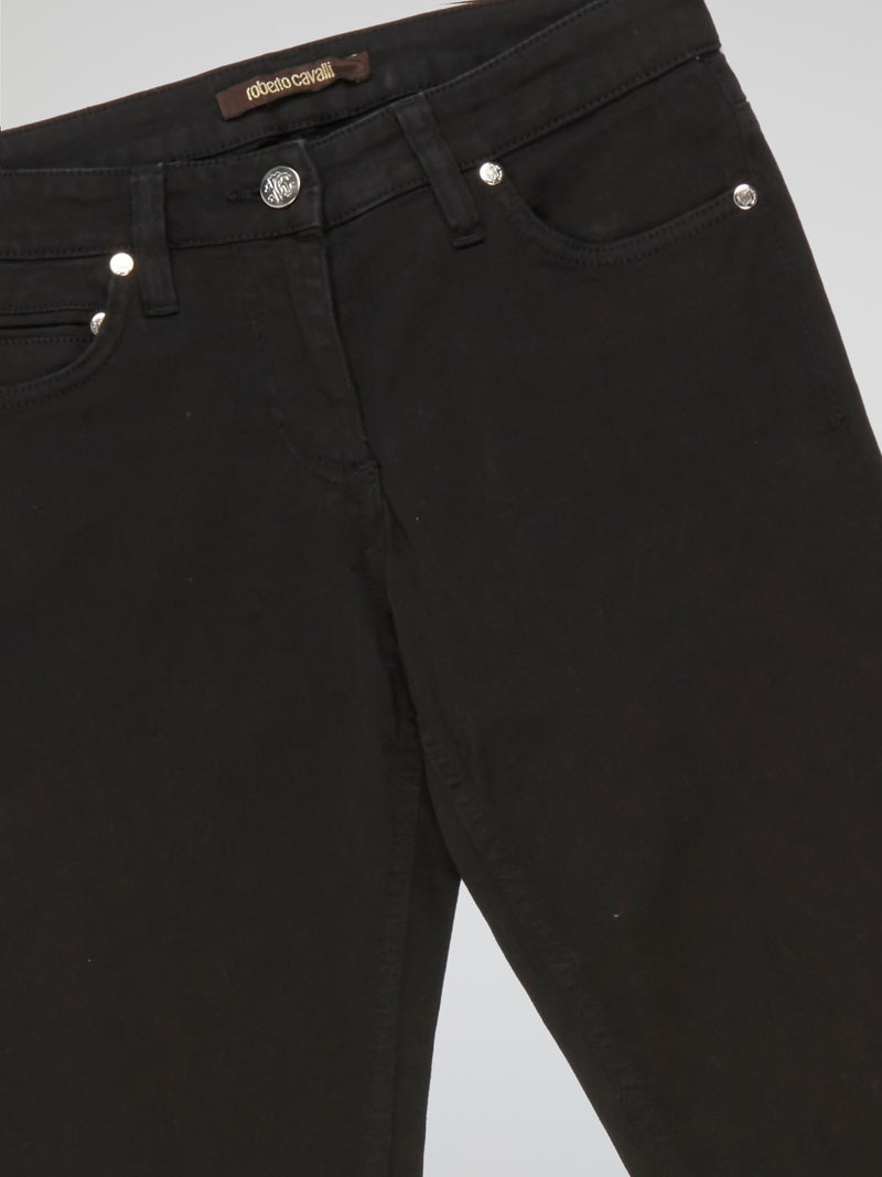 Step into style and unlock a world of sophistication with our Black Straight Fit Jeans by Roberto Cavalli. Crafted from premium quality denim, these jeans seamlessly blend comfort and durability. From casual outings to elegant evening affairs, these jeans effortlessly elevate your fashion game with their sleek, contemporary design.