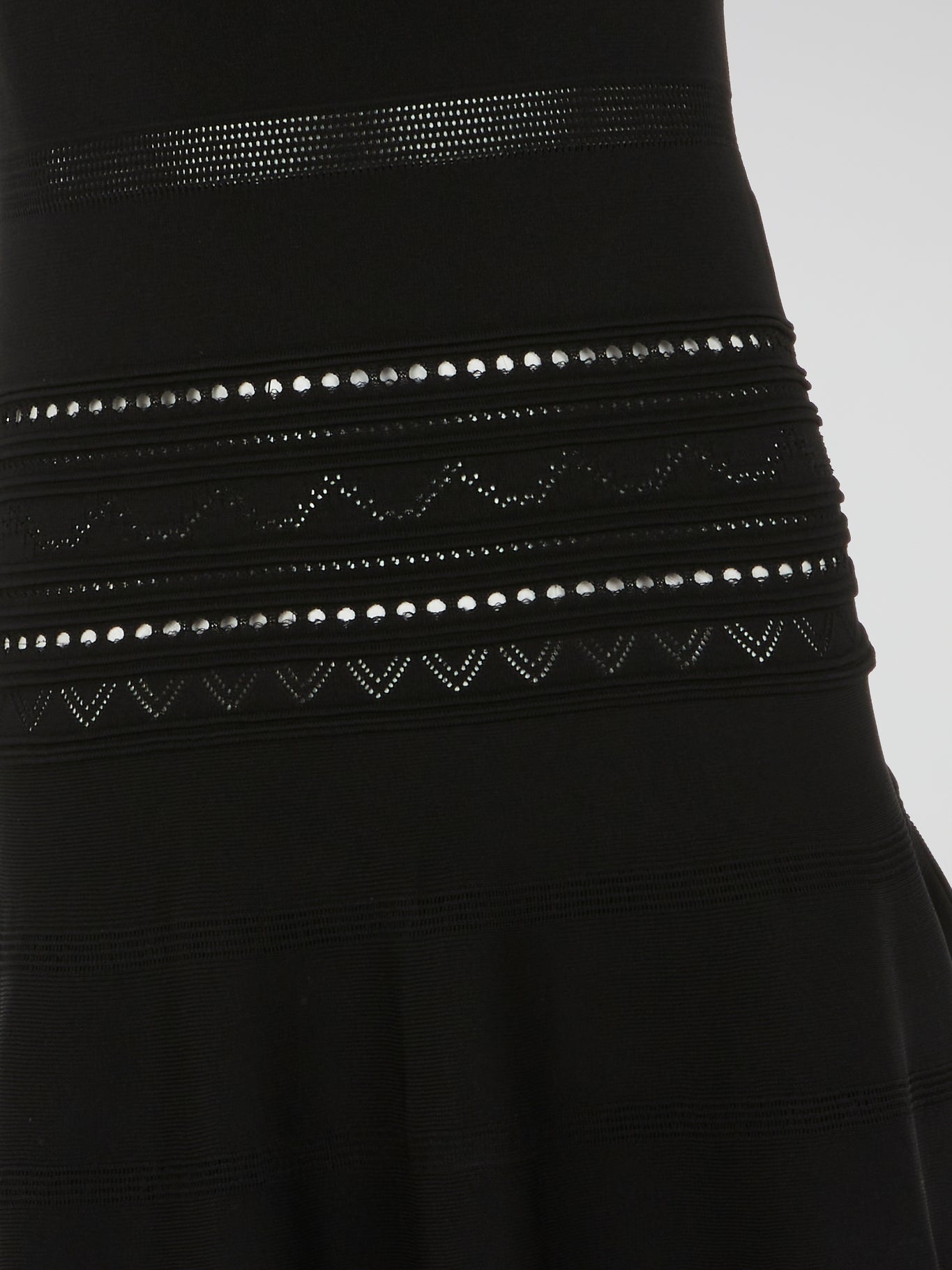 Get ready to turn heads in this stunning Black Studded Flared Dress by Roberto Cavalli. With its edgy studded detailing and flared silhouette, this dress exudes high-octane glamour. Perfect for a night out or any special occasion, it's the ultimate statement piece for those who dare to stand out from the crowd.