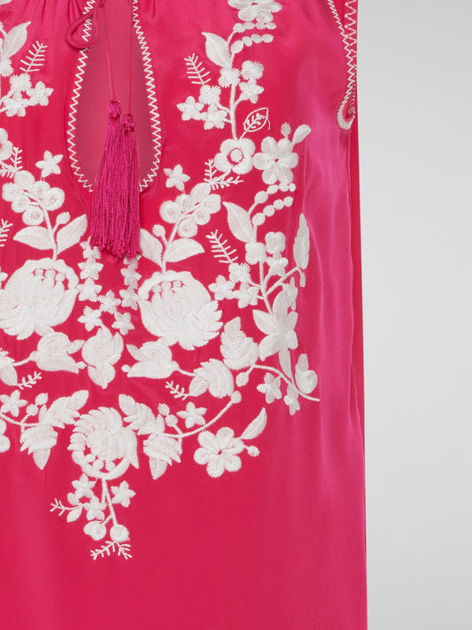 Step into a blooming sanctuary of style with our Pink Floral Embroidered Top by Parosh. Delicately crafted with love, vibrant embroidery dances across the fabric, transforming this ordinary top into a work of wearable art. As you slip it on, you'll instantly feel like you're strolling through a lush garden, ready to turn heads and embrace your inner flower goddess.