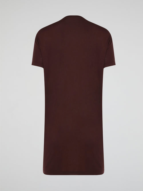 Step out in style with this stunning Burgundy Sequin Embroidered T-Shirt Dress by Roberto Cavalli. The intricate sequin detailing adds a touch of glamour, while the relaxed t-shirt silhouette ensures comfort and ease of wear. Perfect for a night out or special event, this dress is sure to turn heads and make a statement wherever you go.