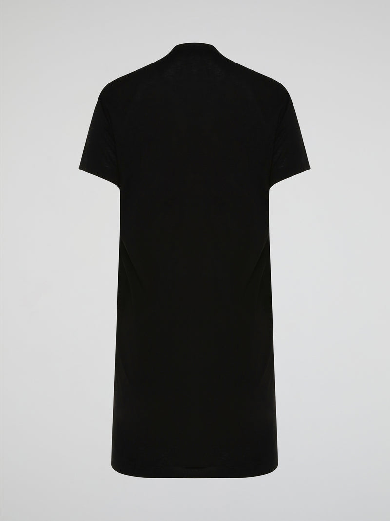 Shimmer and shine in style with the Black Sequin Embroidered T-Shirt Dress from Roberto Cavalli. This versatile piece effortlessly combines casual comfort with high-fashion glamour, making it perfect for any occasion. Stand out from the crowd and turn heads wherever you go in this show-stopping must-have.