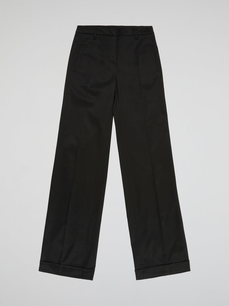 Step up your style game with these sleek and sophisticated Black Straight Leg Trousers by Blumarine. Crafted from premium quality fabric, these trousers are designed to flatter your figure and provide all-day comfort. Perfect for work or a night out, these versatile trousers will have you looking effortlessly chic and stylish.