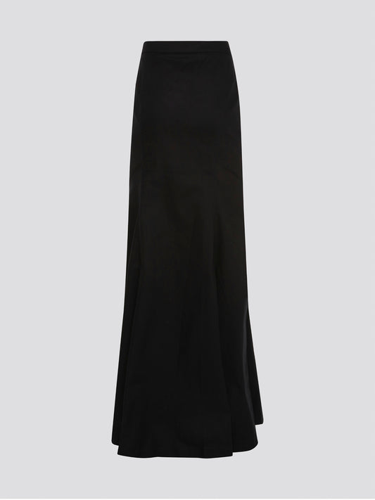 Feel like a queen in the Roberto Cavalli Black Maxi Skirt, exuding elegance and sophistication with every step you take. This stunning piece is crafted with exquisite attention to detail, featuring a flattering silhouette that will make you stand out from the crowd. Elevate your style game and make a statement with this luxurious wardrobe essential.