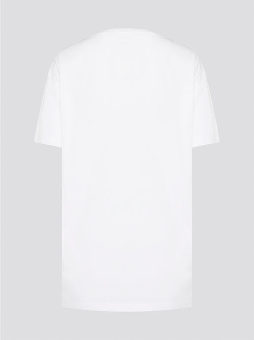 Elevate your casual style with the White Printed Oversized T-Shirt from Roberto Cavalli. Made with premium cotton fabric, this tee features a bold and eye-catching print that will set you apart from the crowd. Whether you dress it up with heels or keep it cool with sneakers, this statement piece is a must-have for your wardrobe.
