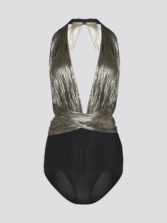 Shimmer like a star in the night sky with the Metallic Bodysuit by Maria Lucia Hohan. This show-stopping piece features a luxurious metallic fabric that hugs your curves in all the right places, while the plunging neckline adds a touch of glamour and allure. Perfect for a night out on the town or a special occasion, this bodysuit will have all eyes on you.
