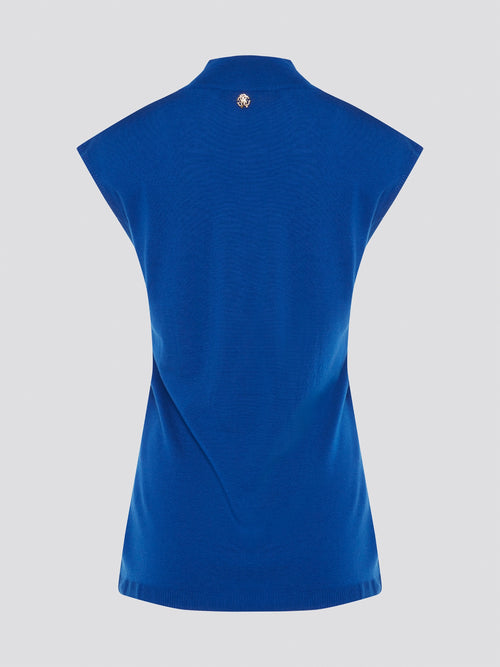 Transform your style with sleek sophistication in this stunning Blue Turtleneck Top by Roberto Cavalli. Crafted with luxurious fabric, this top features a flattering silhouette and eye-catching color that will make you stand out from the crowd. Elevate your wardrobe with this versatile piece that can be dressed up or down for any occasion.