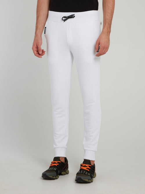 Белые классические спортивные брюки с логотипом