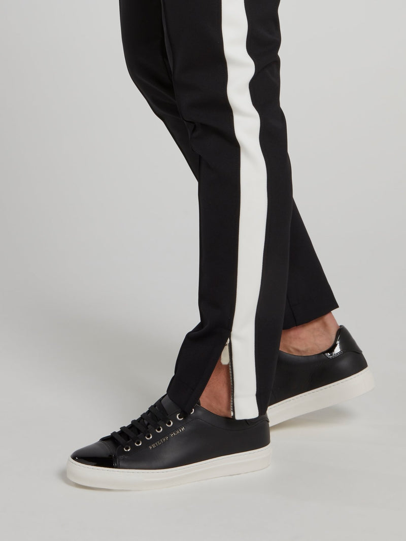 Черные спортивные брюки на шнуровке с лампасами