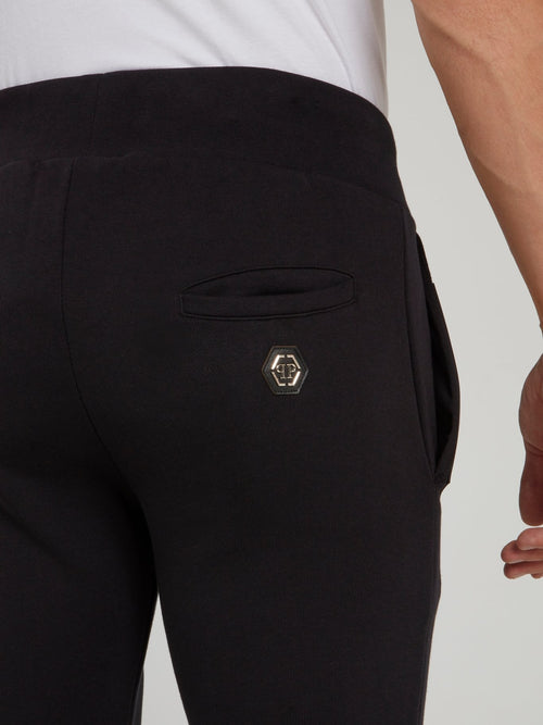 Черные узкие спортивные брюки с логотипом