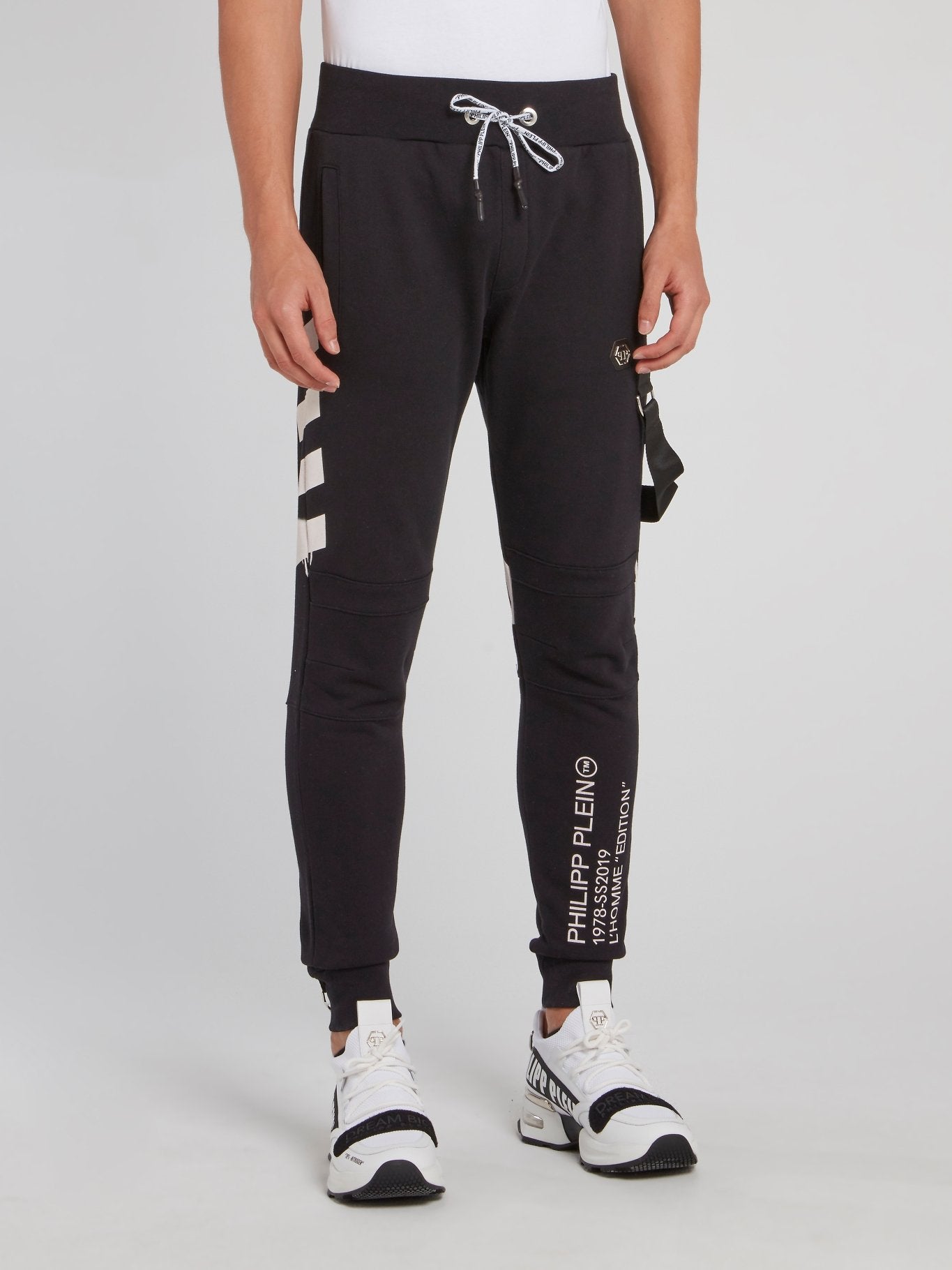 Черные спортивные брюки с отделкой в виде ремней
