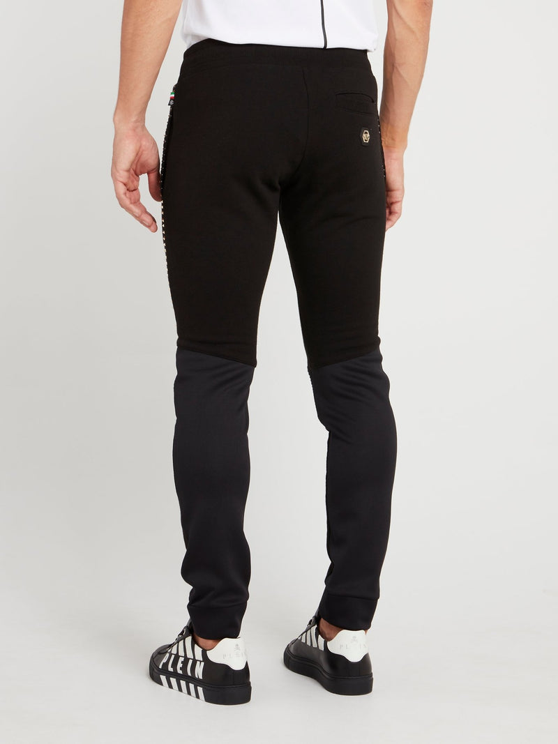 Черные спортивные брюки со вставками на коленях