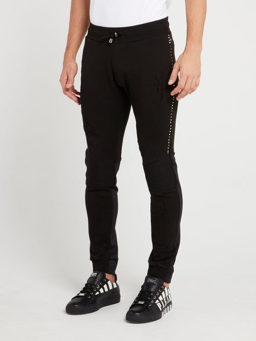 Черные спортивные брюки со вставками на коленях